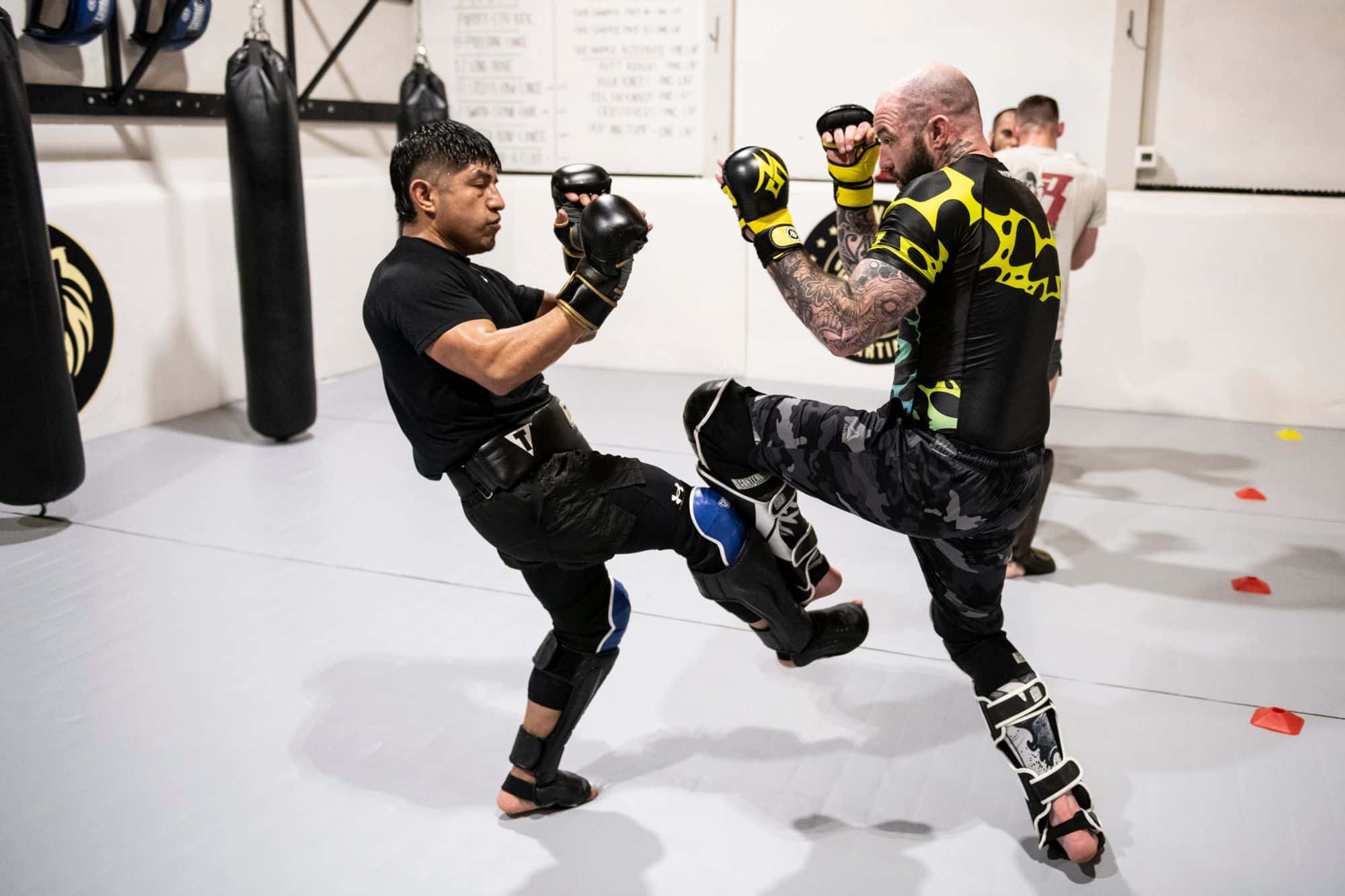 two students sparring during kickboxing class at Royal Mixed Martial Arts