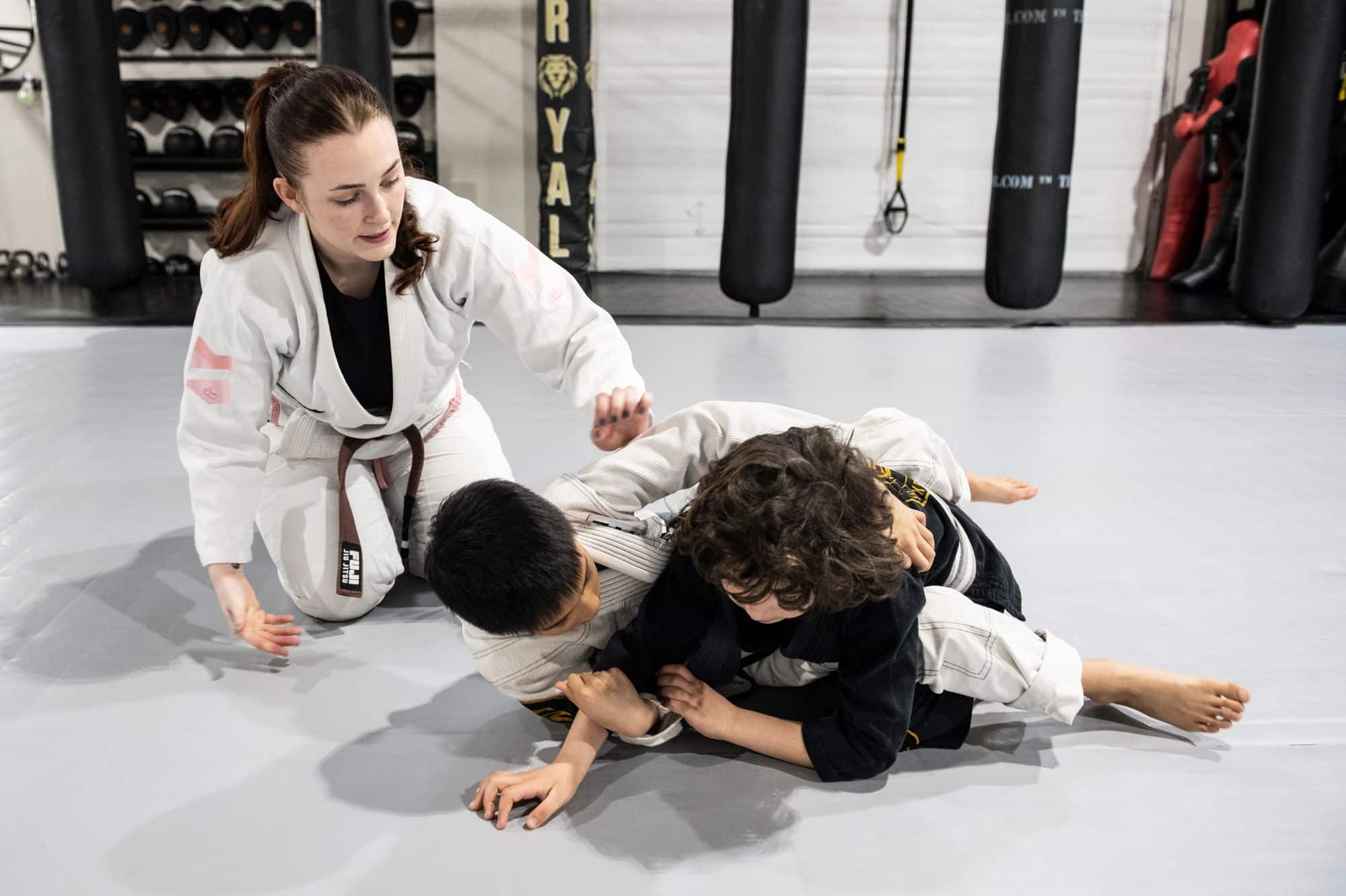 two young students sparring for kids brazilian jiu jitsu class at Royal Mixed Martial Arts