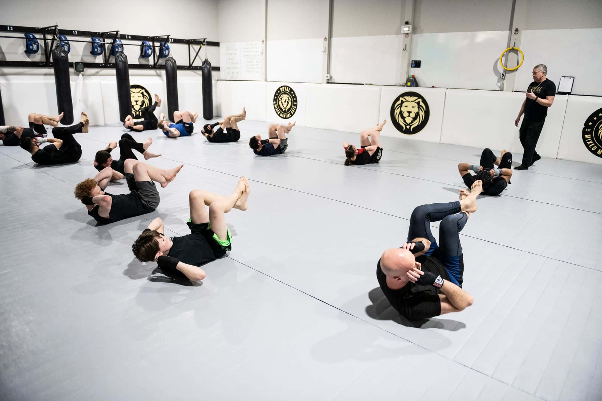 Royal Mixed Martial Arts students warming up before class