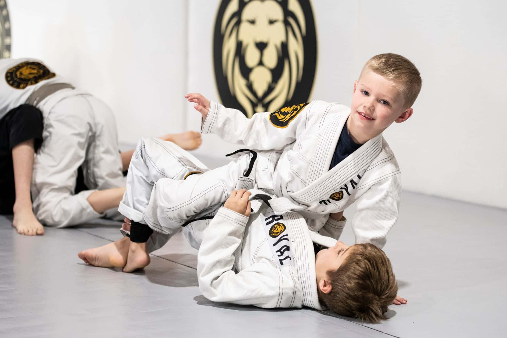 two young jiu jitsu students at Royal Mixed Martial Arts during kids bjj class