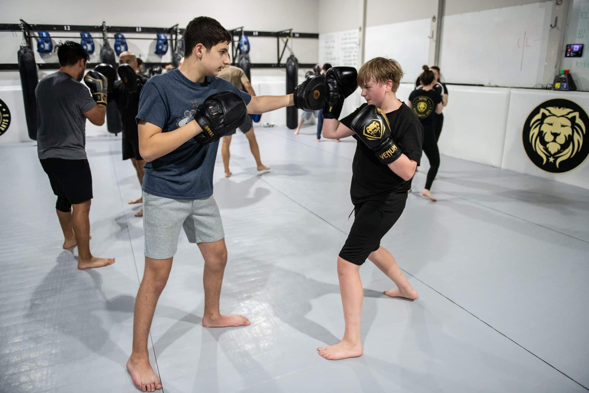 2 students boxing at Royal Mixed Martial Arts Youth Boxing Class