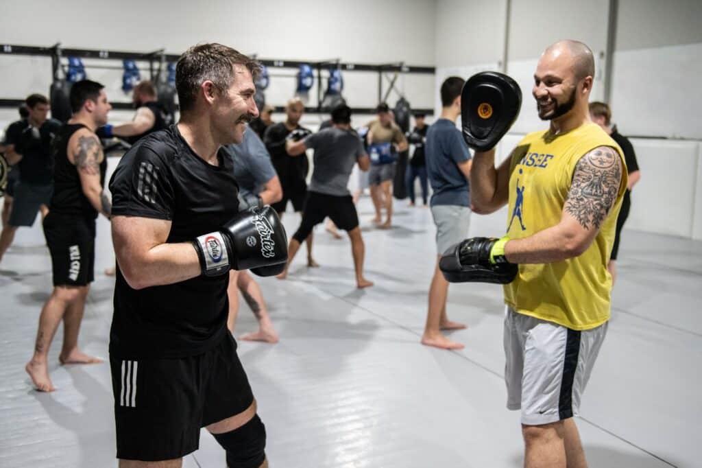 two students practicing during Royal Mixed Martial Arts Boxing Class