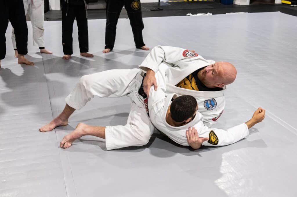 instructors sparring during jiu jitsu class at Royal Mixed Martial Arts