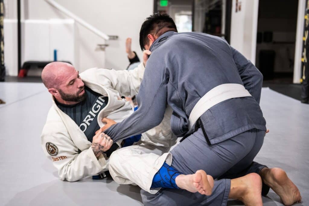 two students grappling for jiu jitsu class at Royal Mixed Martial Arts