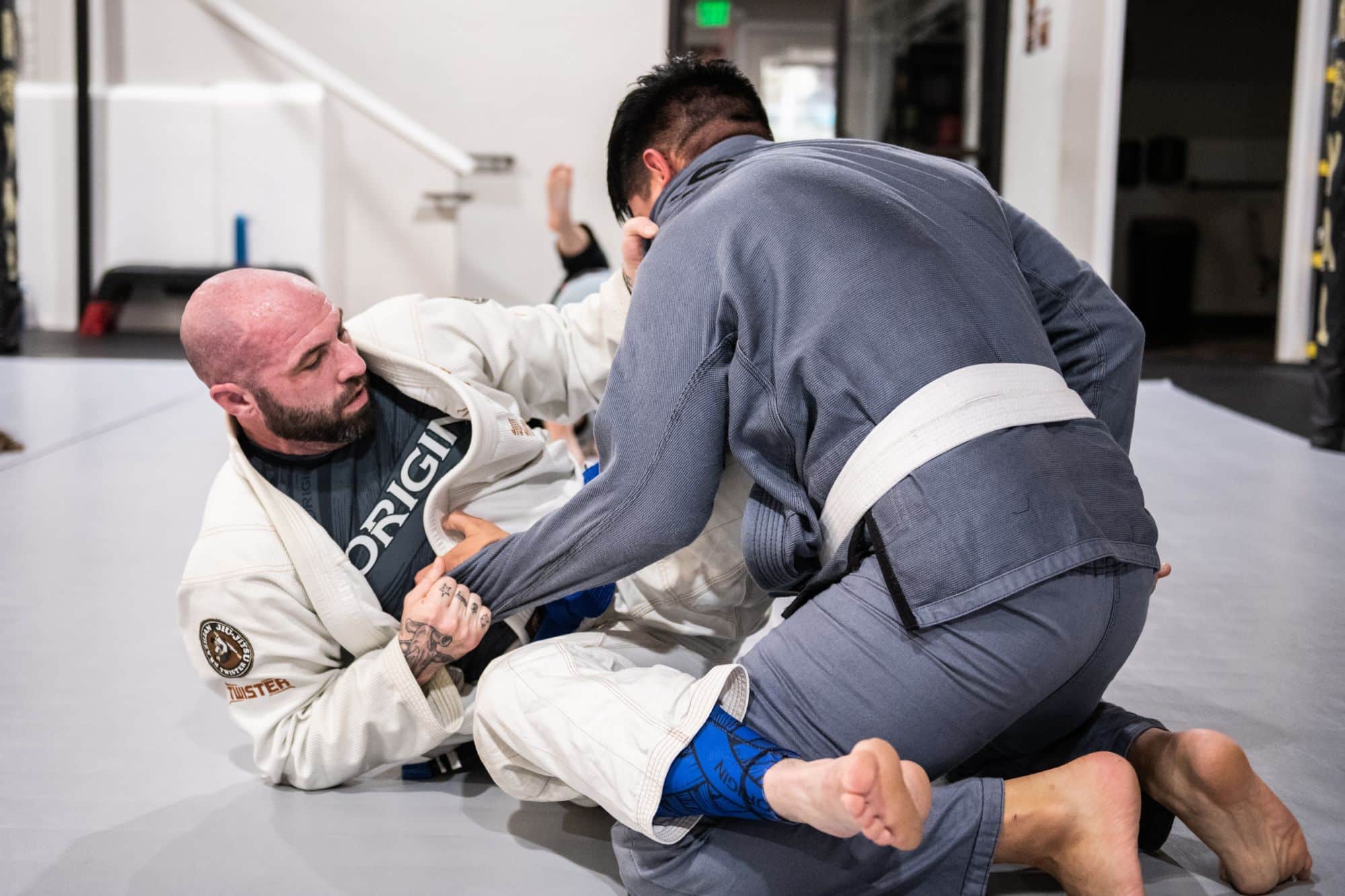two students grappling for jiu jitsu class at Royal Mixed Martial Arts